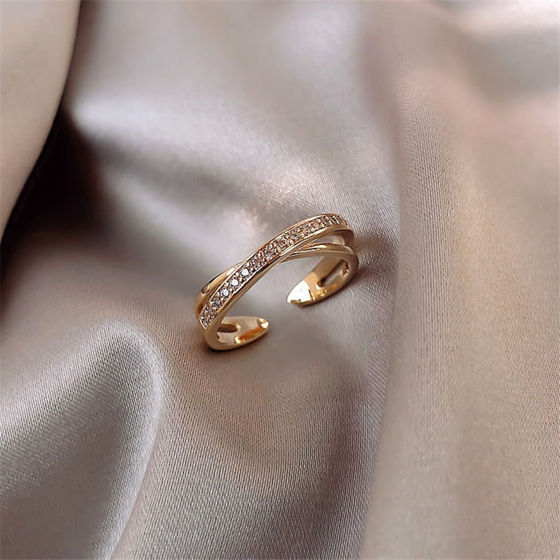 Justerbar ring med gull zirkon sløyfe